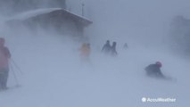 Skiers unfazed by near-blizzard conditions