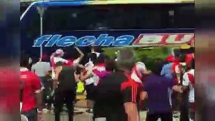 Shocking moment football fans hurl rocks at player bus