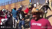 İltica başvurularının yavaşlatılmasını protesto eden göçmenler, ABD-Meksika sınırına yürüdü