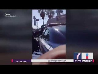 Conductora corretea a un policía de tránsito | Noticias con Yuriria Sierra