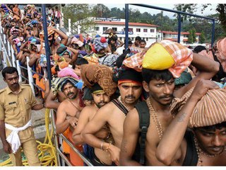 ശബരിമലയില്‍ കാണിക്കയായി അയ്യപ്പന്‍റെ ചിത്രം ചേര്‍ത്ത നോട്ടുകള്‍