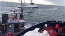Russian ship collides with Ukrainian boat