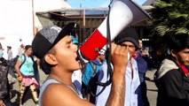 US border police lob tear gas over fence as migrant caravan approaches