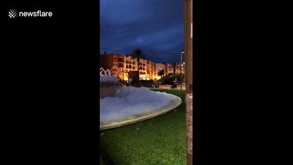 Foam party! Spanish police baffled after pranksters fill fountain with washing powder