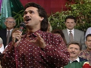 Bill & Gloria Gaither - Saved By The Hands