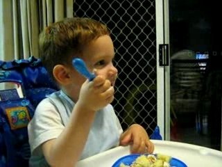 Ozan eating his birthday cake