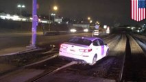 Woman drives onto train tracks because of her GPS