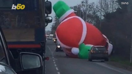 An Escaped Giant Inflatable Santa Causes Major Traffic Delays