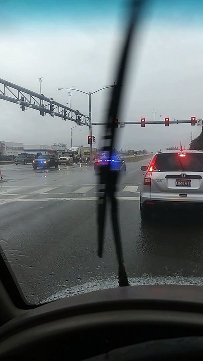 Car Speeds past on Rims During High-Speed Pursuit