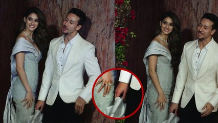 Deepika - Ranveer Reception: Tiger Shroff holds Disha Patani's dress; Watch Video | FilmiBeat