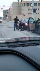 Men Trade Blows at Traffic Light