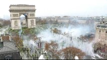 French police arrest scores as vehicles torched in Paris clashes