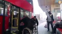 Two men in wheelchair fight over bus