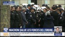 Emmanuel Macron salue les forces de l'ordre et les pompiers rassemblés avenue Kléber à Paris