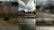Large tornado looms ominously overhead