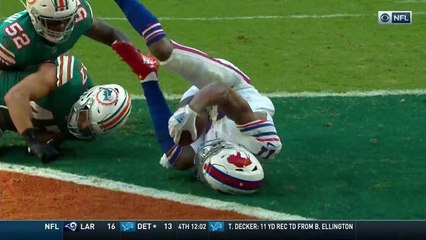Allen squeezes ball between three defenders to Zay for TD