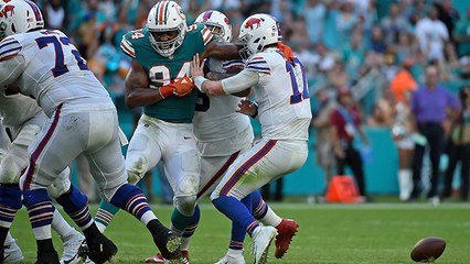 Robert Quinn strips ball from Allen on third-and-16
