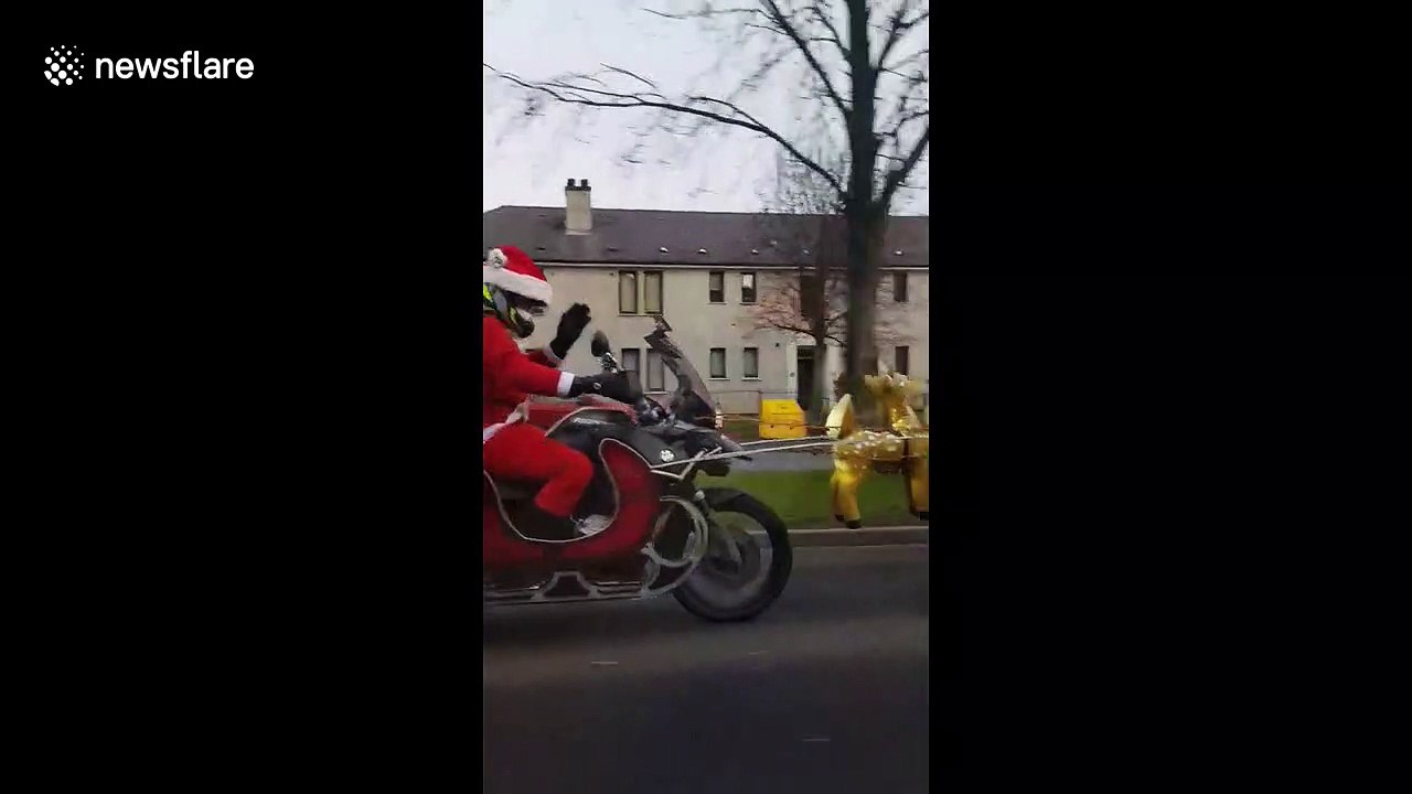 Santa rides into this Scottish town on a motorbike