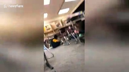 Footage shows the moment students duck under tables as 7.0-magnitude strikes Anchorage, Alaska
