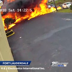 Surveillance camera captures video of plane crashing into building, 2 Dead