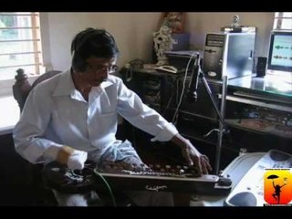 001-SRINIVAS ANCHE Playing folk instrument Shaibaza for WWW.KANNADATIMES.COM