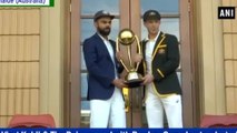 India vs Australia 1st Test : Virat Kohli and Tim Paine pose with the Border–Gavaskar Trophy