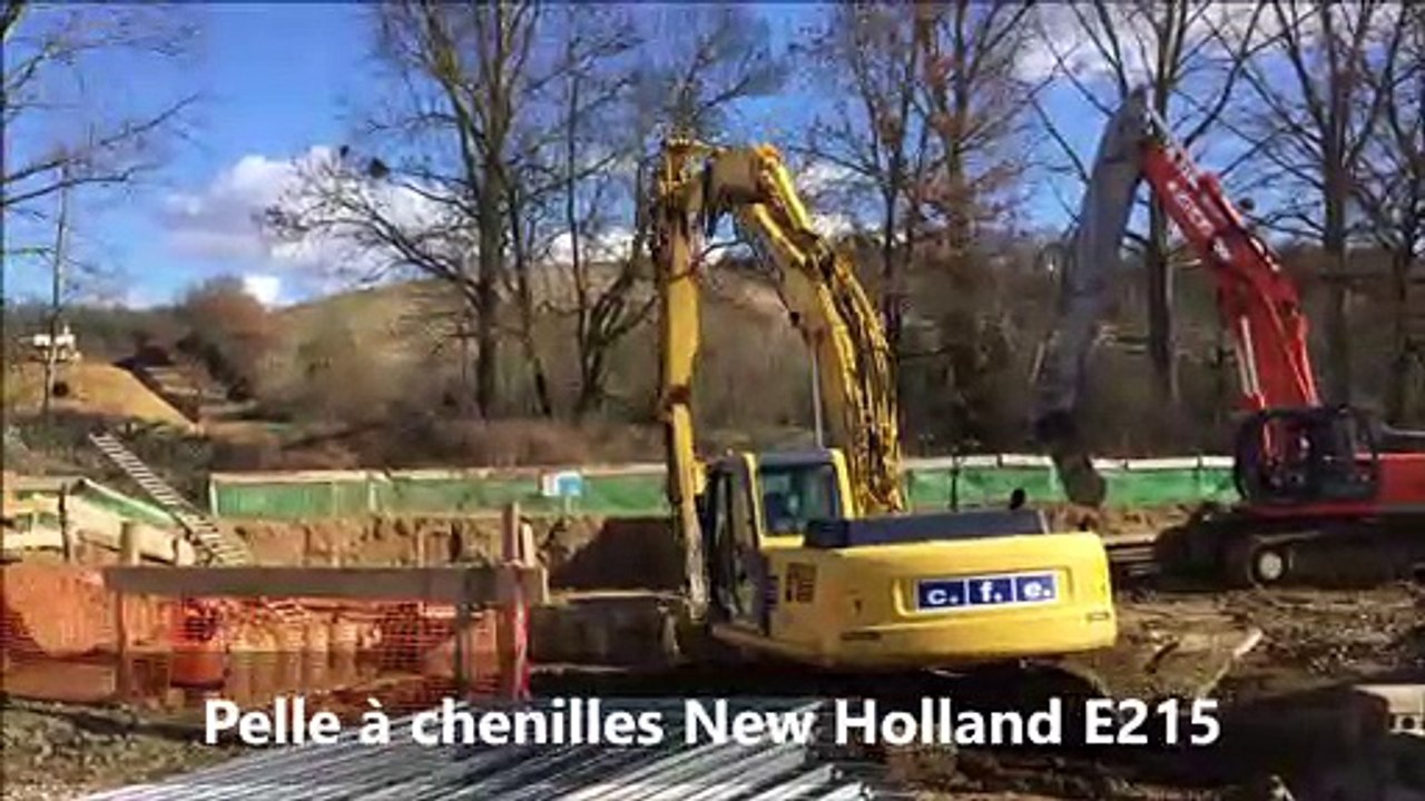 Pelle à chenilles longue portée New Holland E215 LC (3 balanciers) - Machine CFE Location