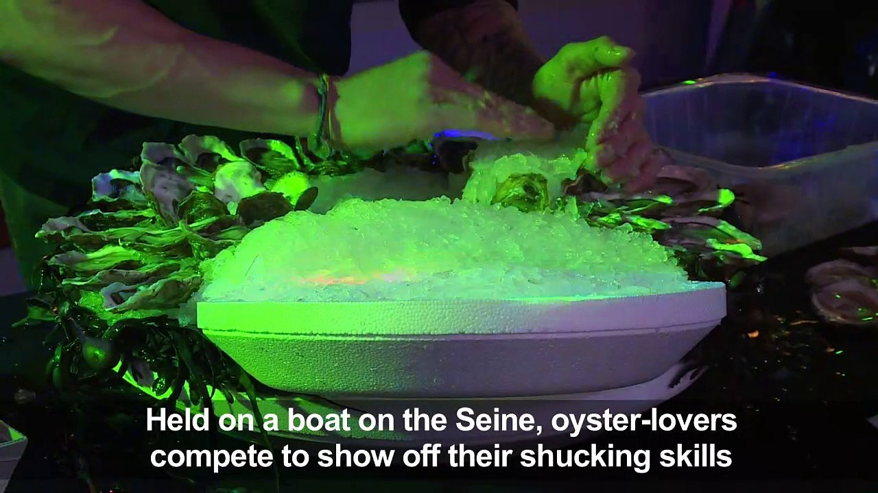 Oyster shucking contest on Parisian boat
