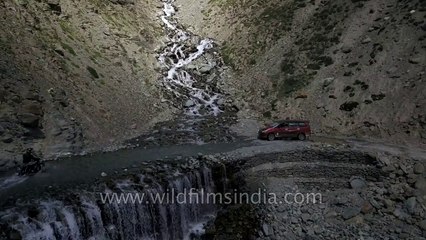Stream crossing on bikes en route Chandratal in Spiti- aerial adventure