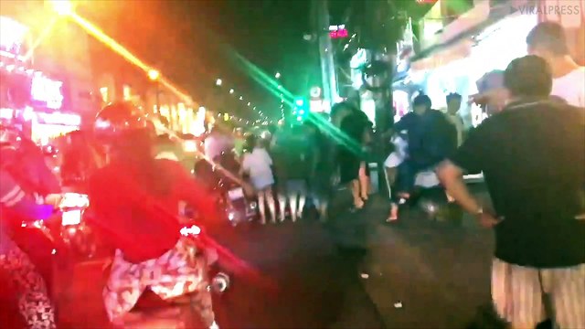 Moped Thief Surrounded By Locals