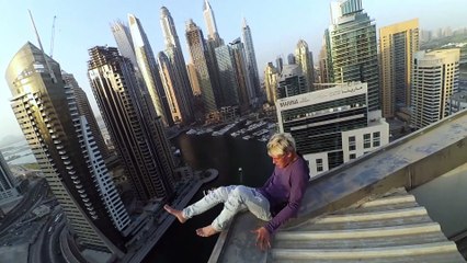 Man Performs Some High-Rise Stunts