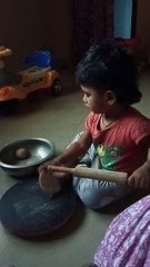 Funny chapati making - young girl getting in practice early!!