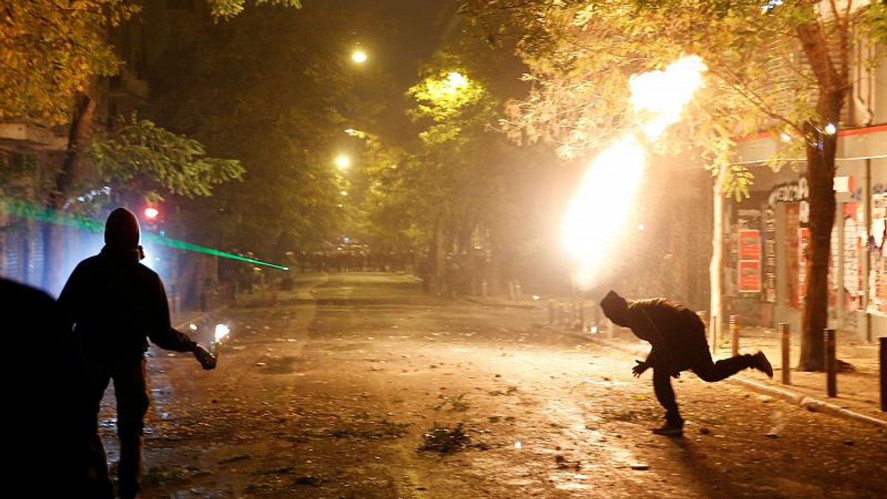 Athens riots: police clash with protesters on 1...