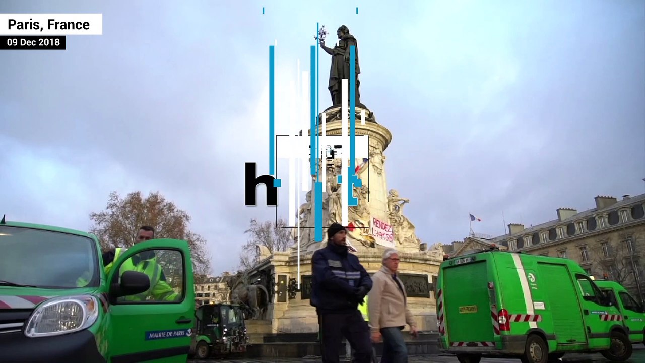 Paris shops reopen, streets cleaned up after ye...