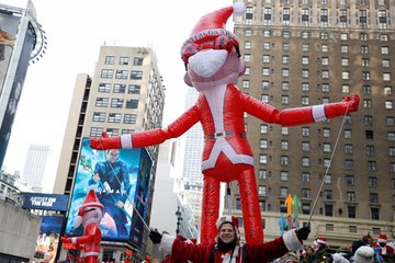 Thousands of Santas get merry for London’s Santacon