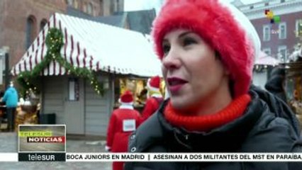 Miles de personas participan en el "Maratón de Santa Claus" en Letonia
