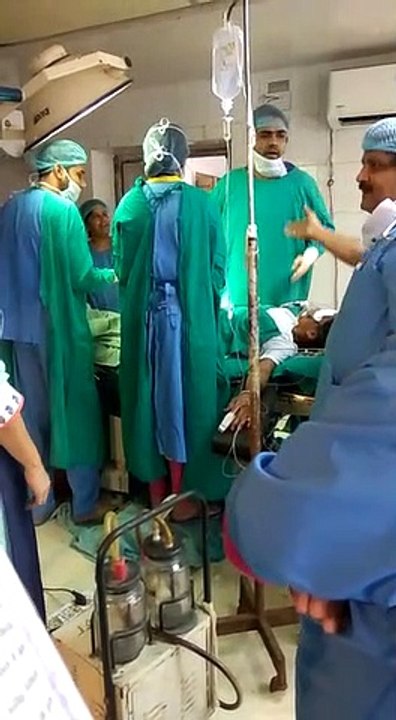 Surgeons fight during operation