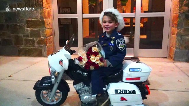 Kansas' Officer Oliver melts hearts and brings festive cheer to nursing home residents