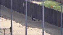 Meksika Sınırında Göçmen Krizi Sürüyor- Trump'ın Övdüğü Meksika Duvarından Atlamaya Çalışan...