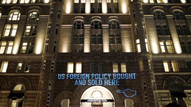 Protesters Project Trump Ties To 'Autocratic Leaders' On His DC Hotel