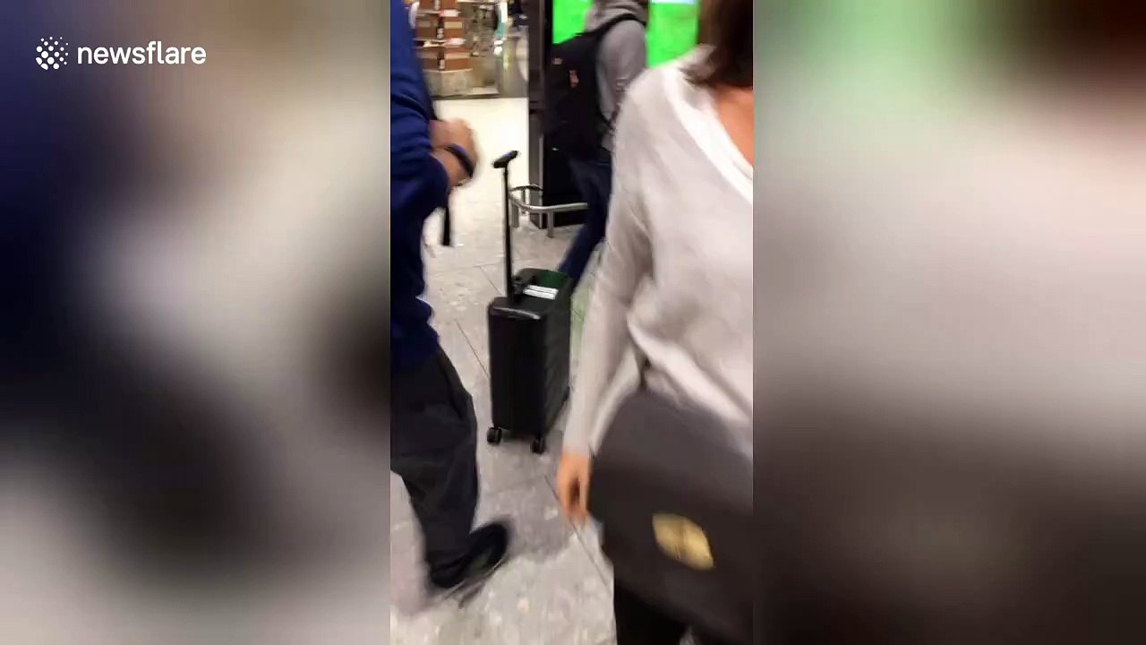 Woman is chased by her own automated suitcase through Heathrow airport