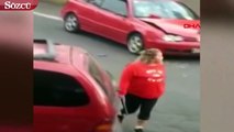 Kadın sürücünün öfkesi dinmedi Önce sopayla vurdu, sonra arabayla çarptı