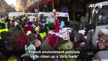 Climate activists protest French bank's investment in shale gas