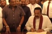 Mahinda resigns his post with a smile