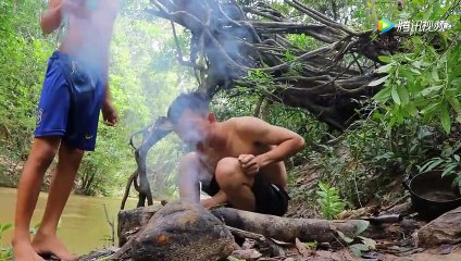Wilderness kid cooking delicious ducks by the river, eating delicious