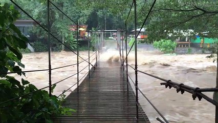 Flash Floods Batter Hanging Bridge