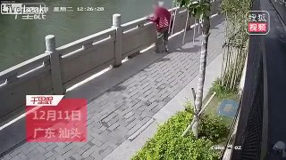 Man kicks a cat into the river China Animal Abuse