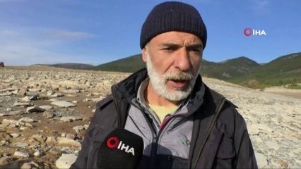 Barajda sular çekildi, kemik parçaları ortaya çıktı...Baraj gölü havadan görüntülendi