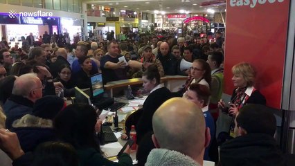 Travellers mob Gatwick service desk only to be told all flights are cancelled
