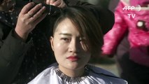 Chine: quatre femmes se rasent la tête pour réclamer justice